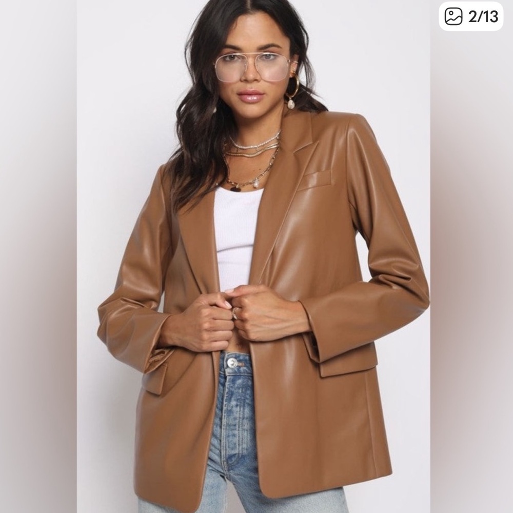 12th tribe leather blazer jacket. Brand new never worn. Just wrinkled sorry